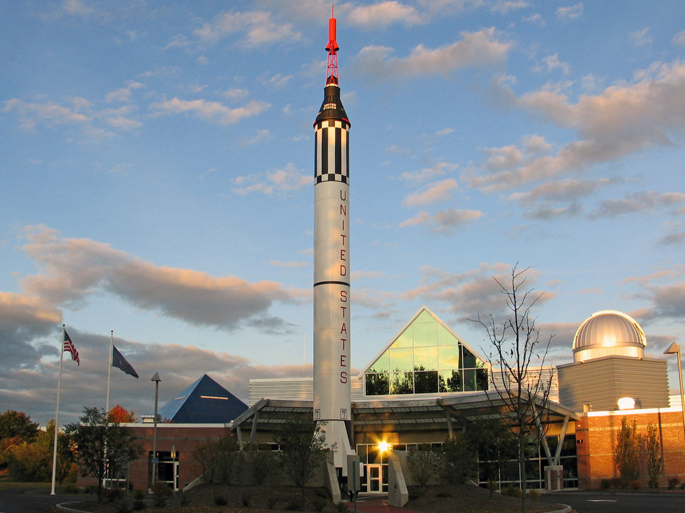 MSDC's Redstone Plaza, highlighting its 1/6 scale Redstone Rocket, with the Discovery Center in the background