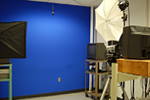 PSU Weather broadcast classroom, featuring a large blue screen and television monitors